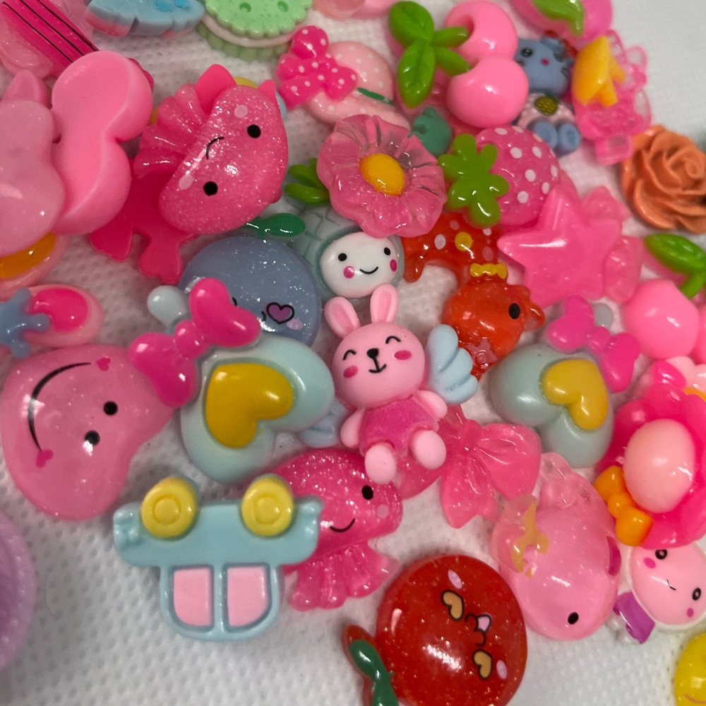 Pink charms for nail decoration.